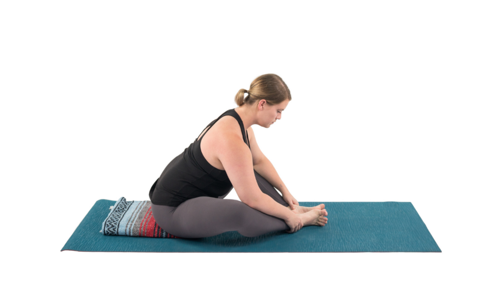 bending forward in BoundAngle Pose or Baddha Konasana Pose