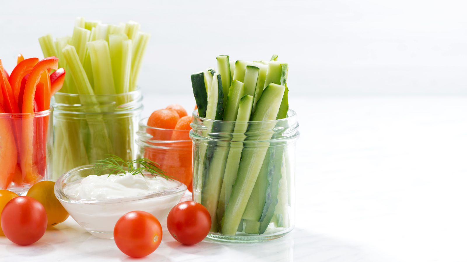 Healthy snacks, mixed vegetables and yogurt